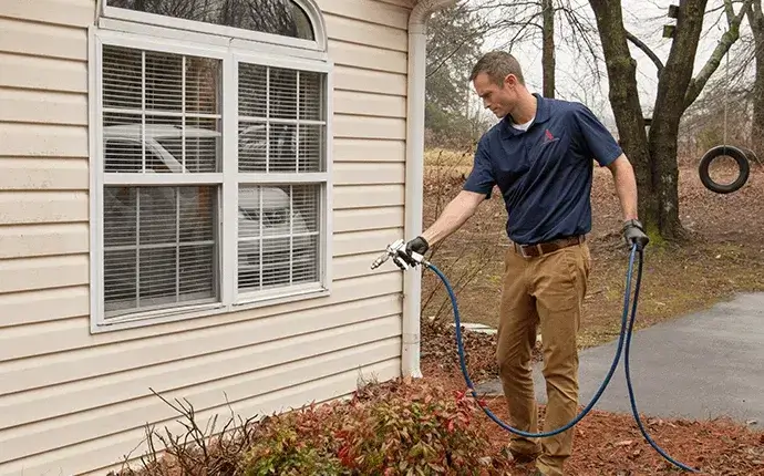 a man provides termite control services in north carolina